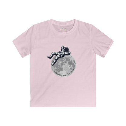 Pink kids moon kids tee with astronaut relaxing on moon graphic by Printify