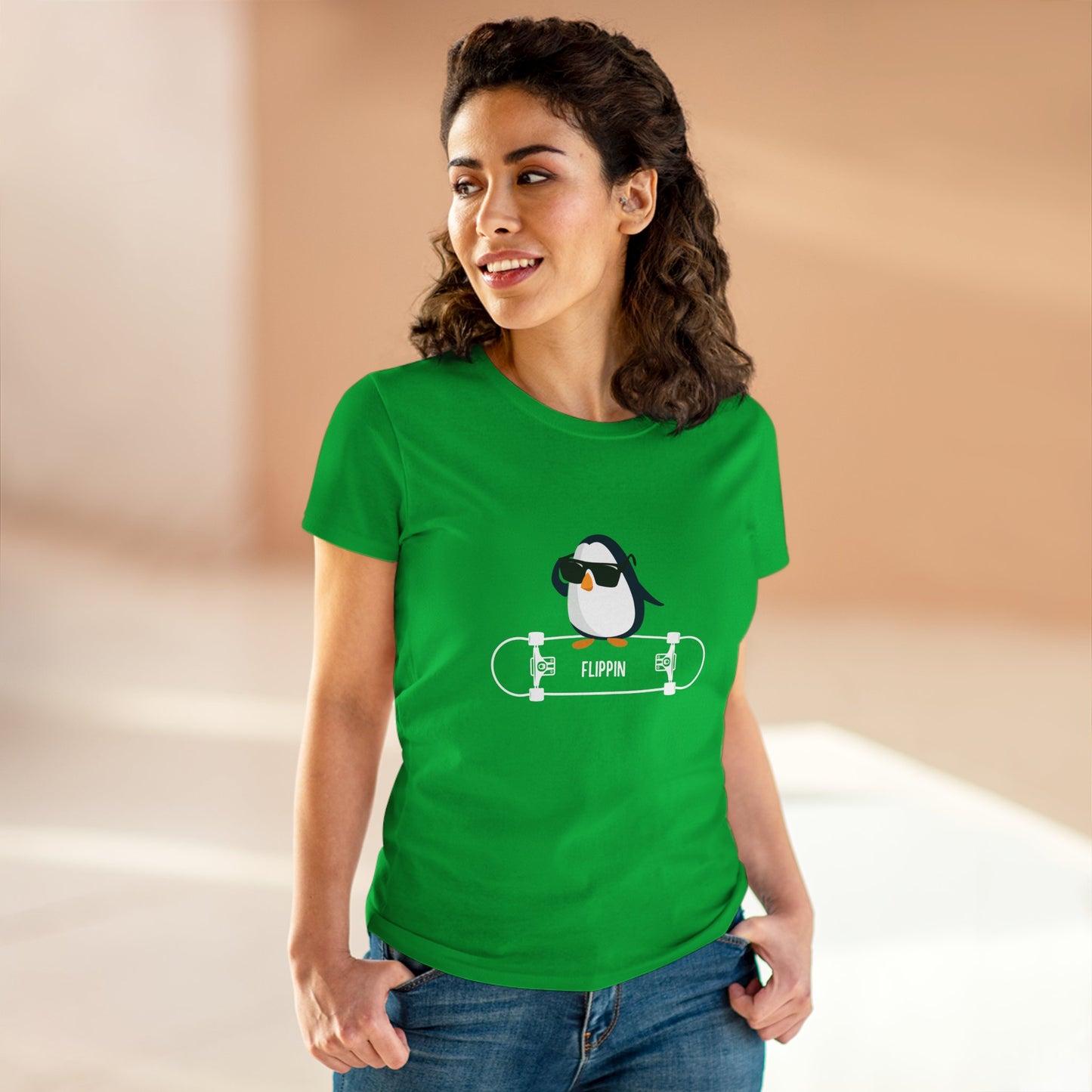 Green Adélie penguin tee by Printify featuring a cool penguin with sunglasses on a skateboard