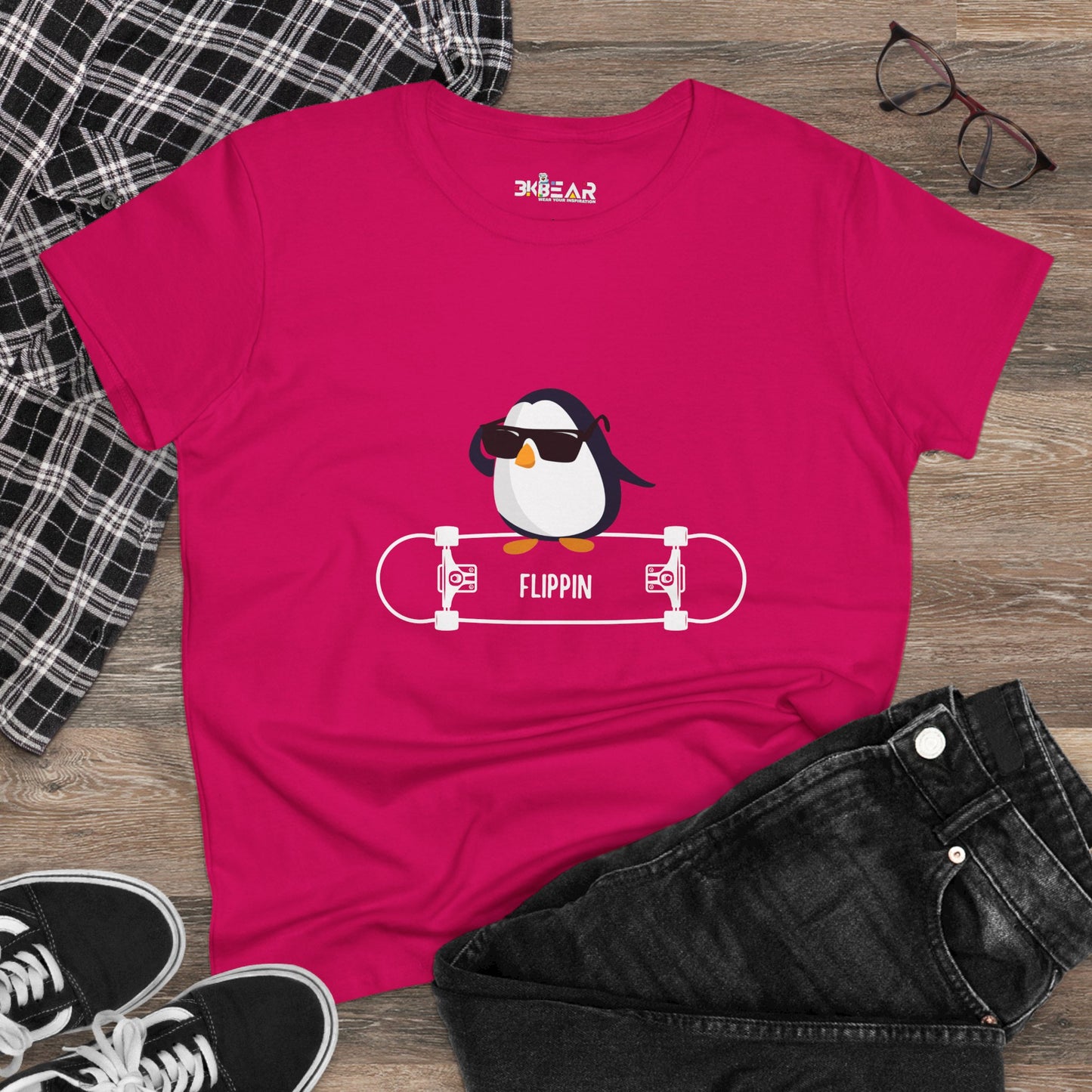 Printify Adélie penguin tee in pink with cool penguin graphic on skateboard and text flippin