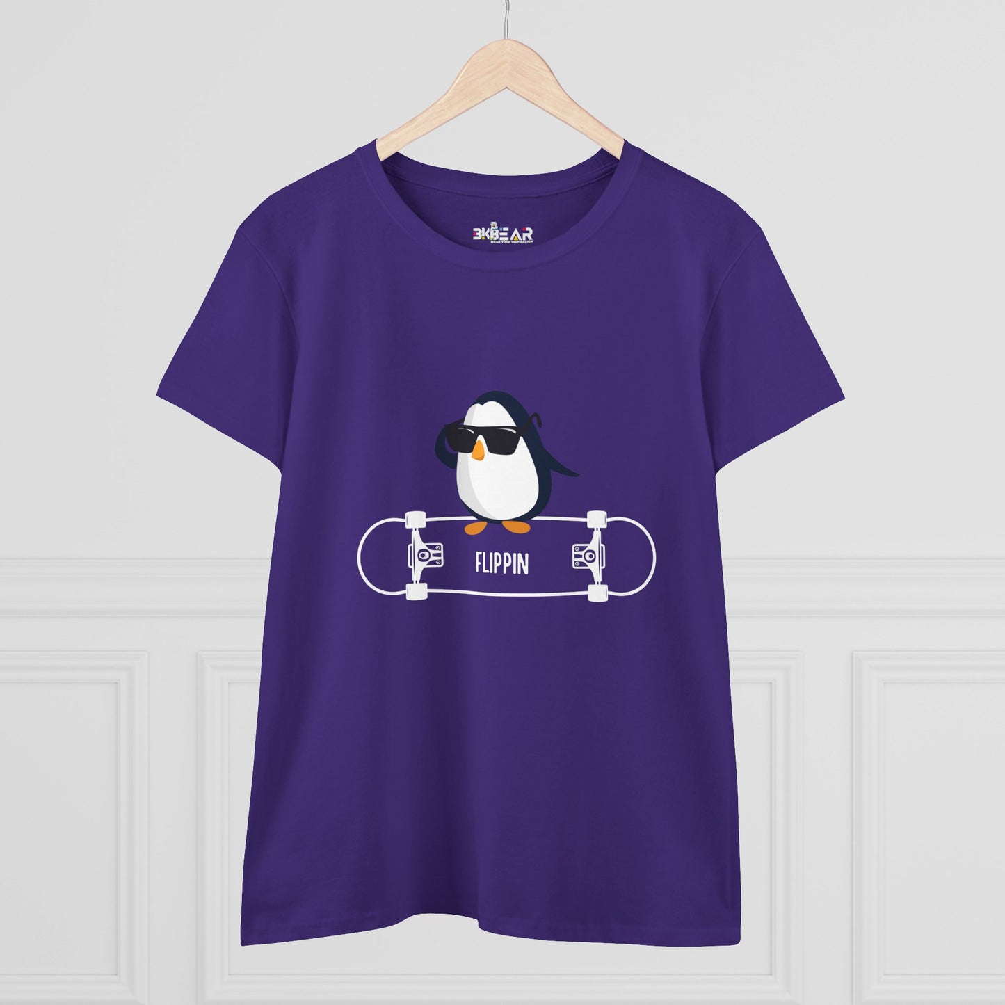 Purple Printify Adélie penguin tee with graphic of penguin wearing sunglasses on skateboard