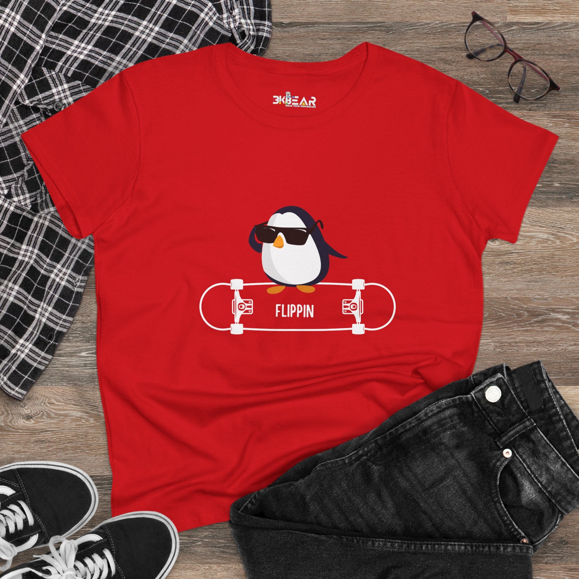 Red Adélie penguin tee with cool penguin on skateboard and sunglasses printed on front