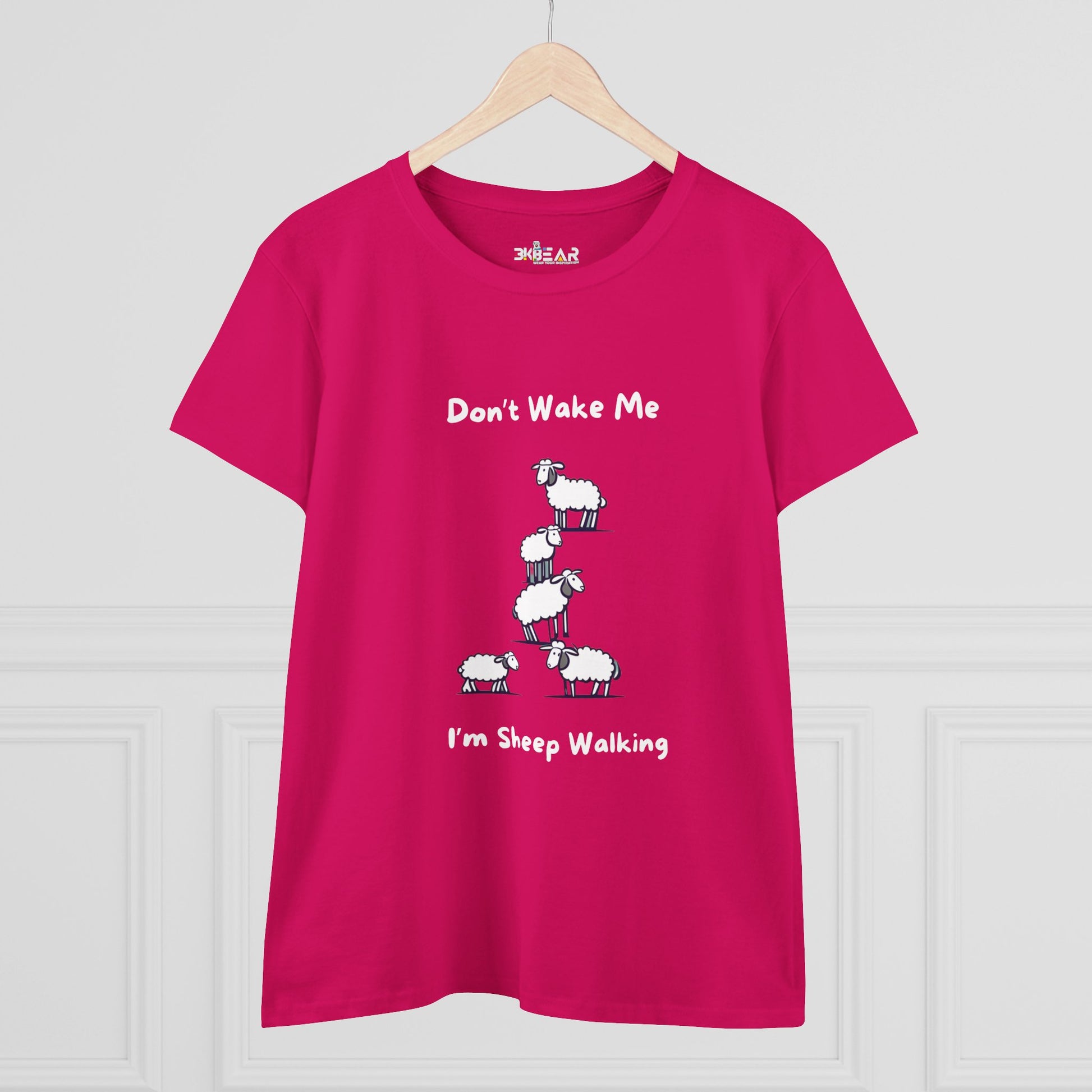 Funny sheep graphic t-shirt in bright pink with cartoon sheep and text Dont Wake Me Im Sheep Walking