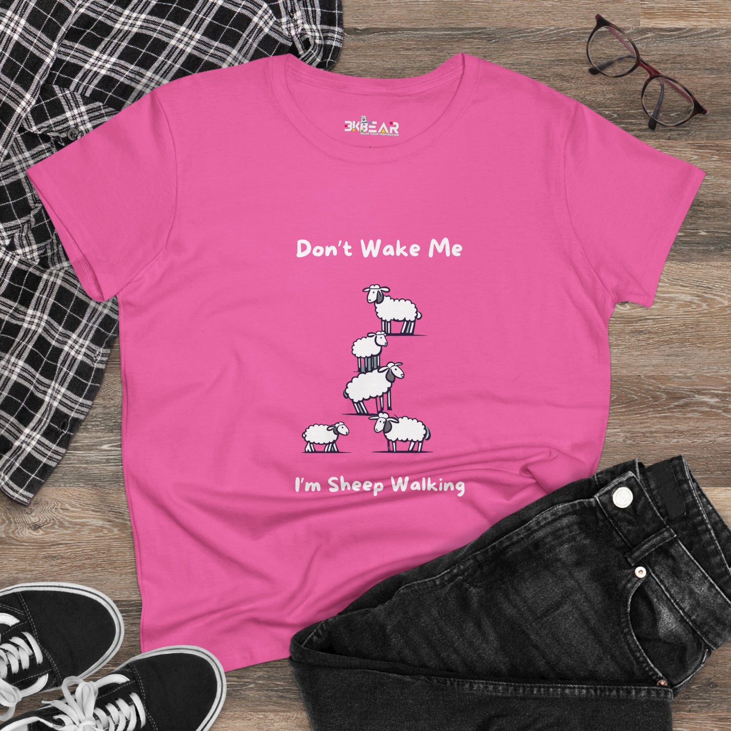 Pink funny sheep graphic t-shirt with cartoon sheep and text Don’t Wake Me I’m Sheep Walking