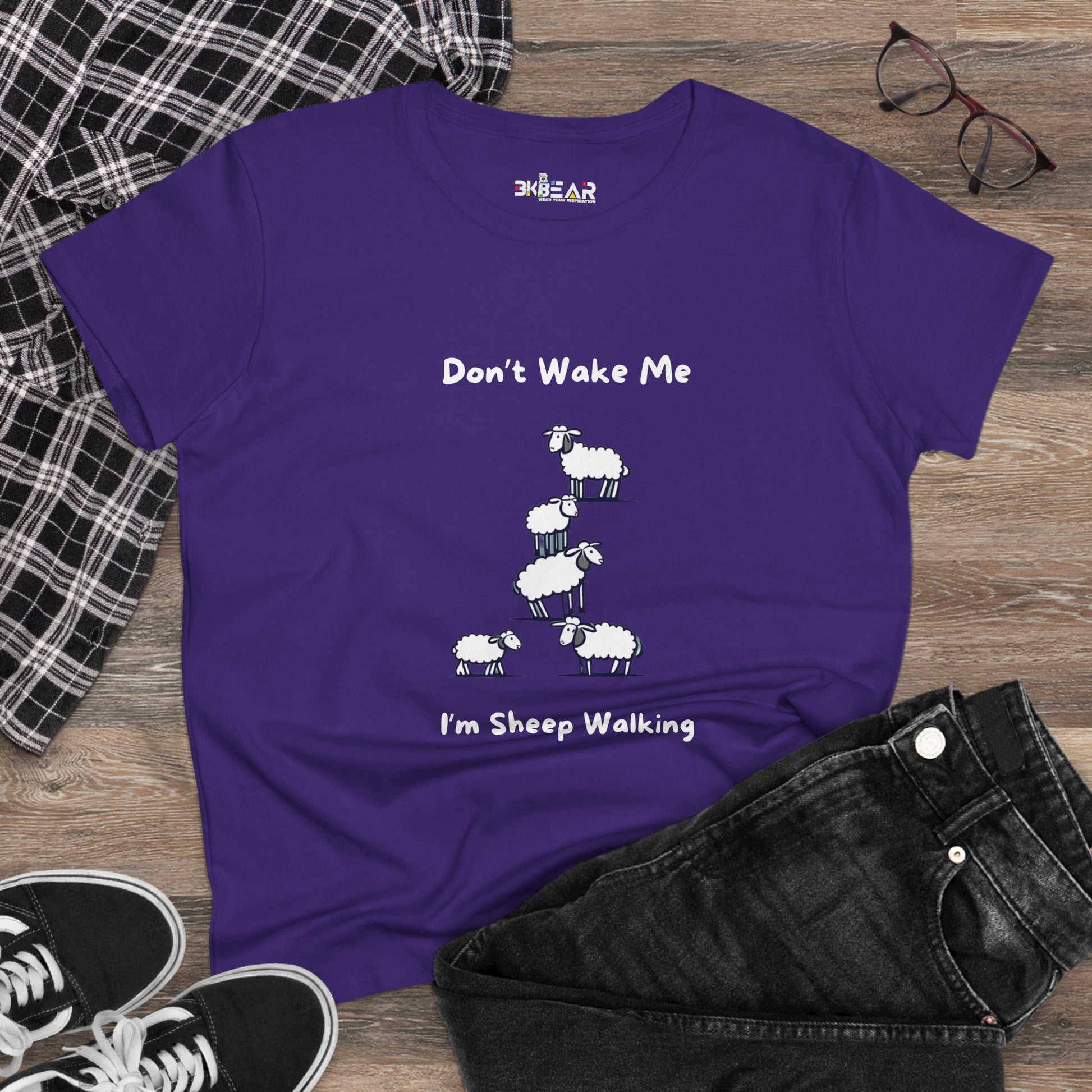 Purple funny sheep graphic t-shirt with cartoon sheep and text Dont Wake Me Im Sheep Walking