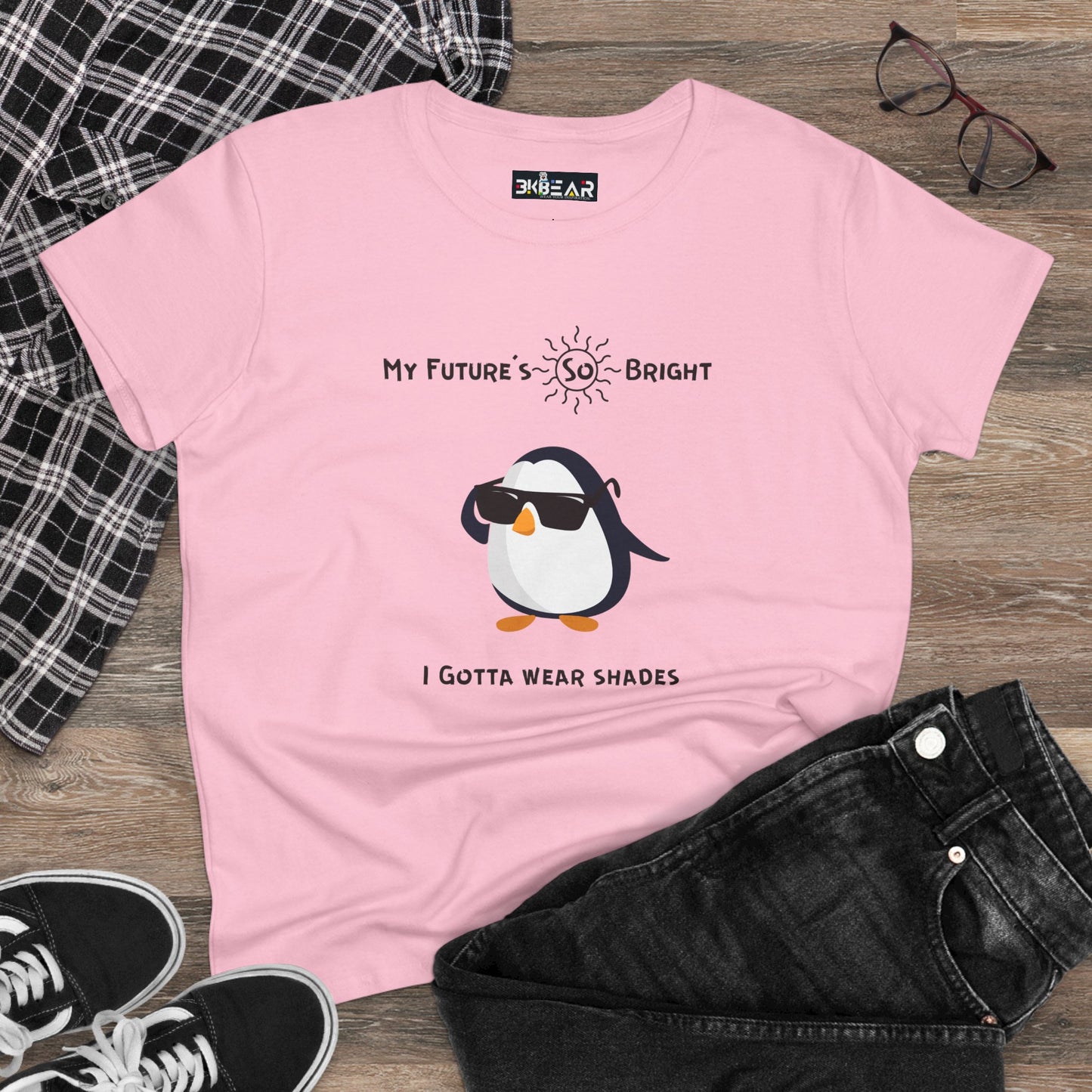 Pink future is bright t-shirt for women with sunglasses-wearing penguin graphic and motivational text
