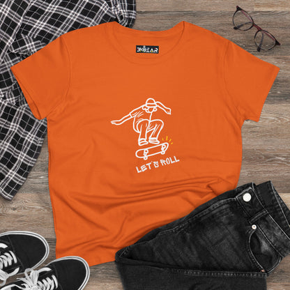 Orange Let’s Roll shirt with skateboard graphic, laid flat with black jeans and plaid shirt