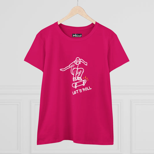 Pink Printify Let’s Roll shirt with white skateboarder graphic hanging on wooden hanger
