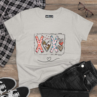 Light gray sign of love shirt with colorful heart and XOX design laid out with black jeans and sneakers