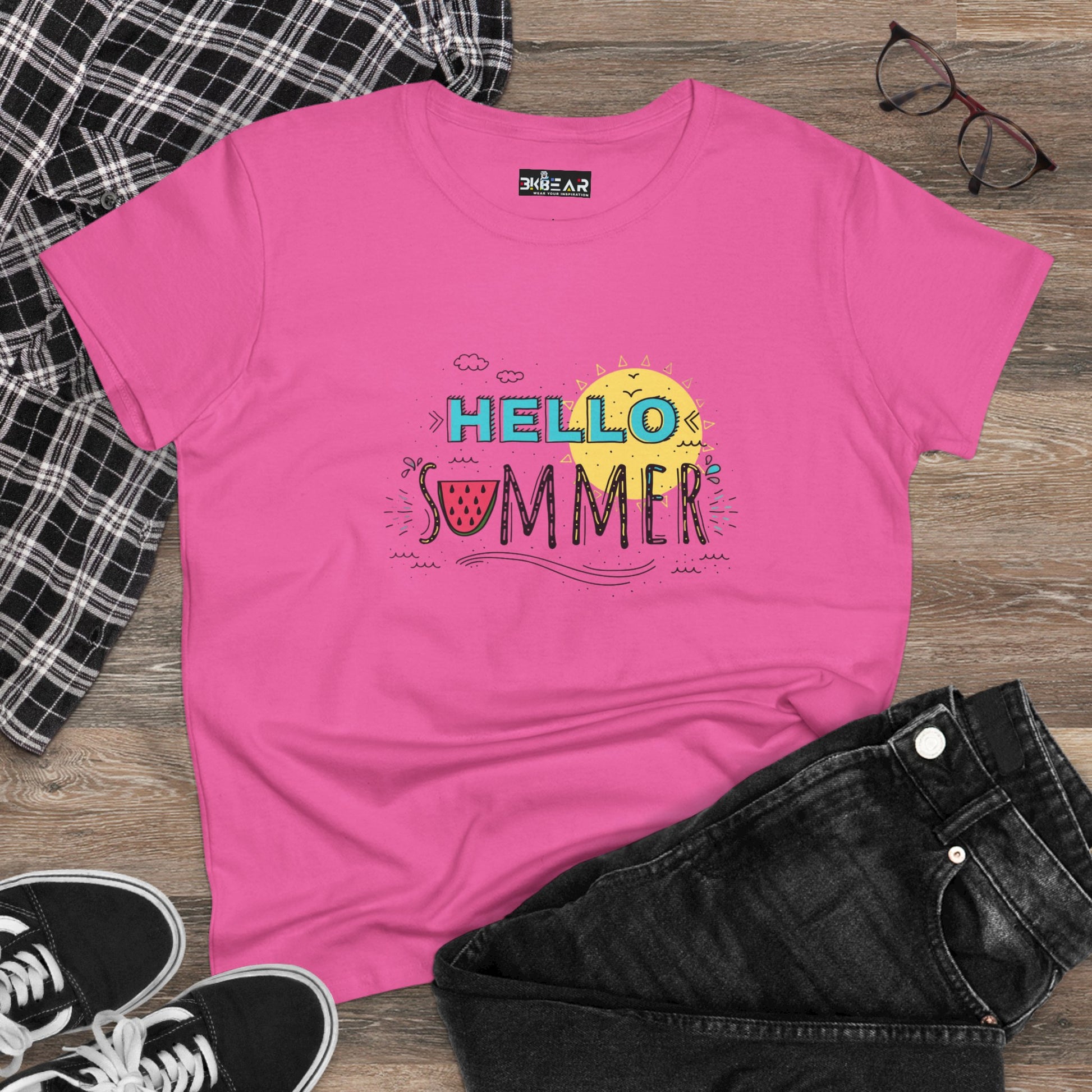 Pink beach vibes shirt with colorful Hello Summer graphic displayed with casual jeans and sneakers