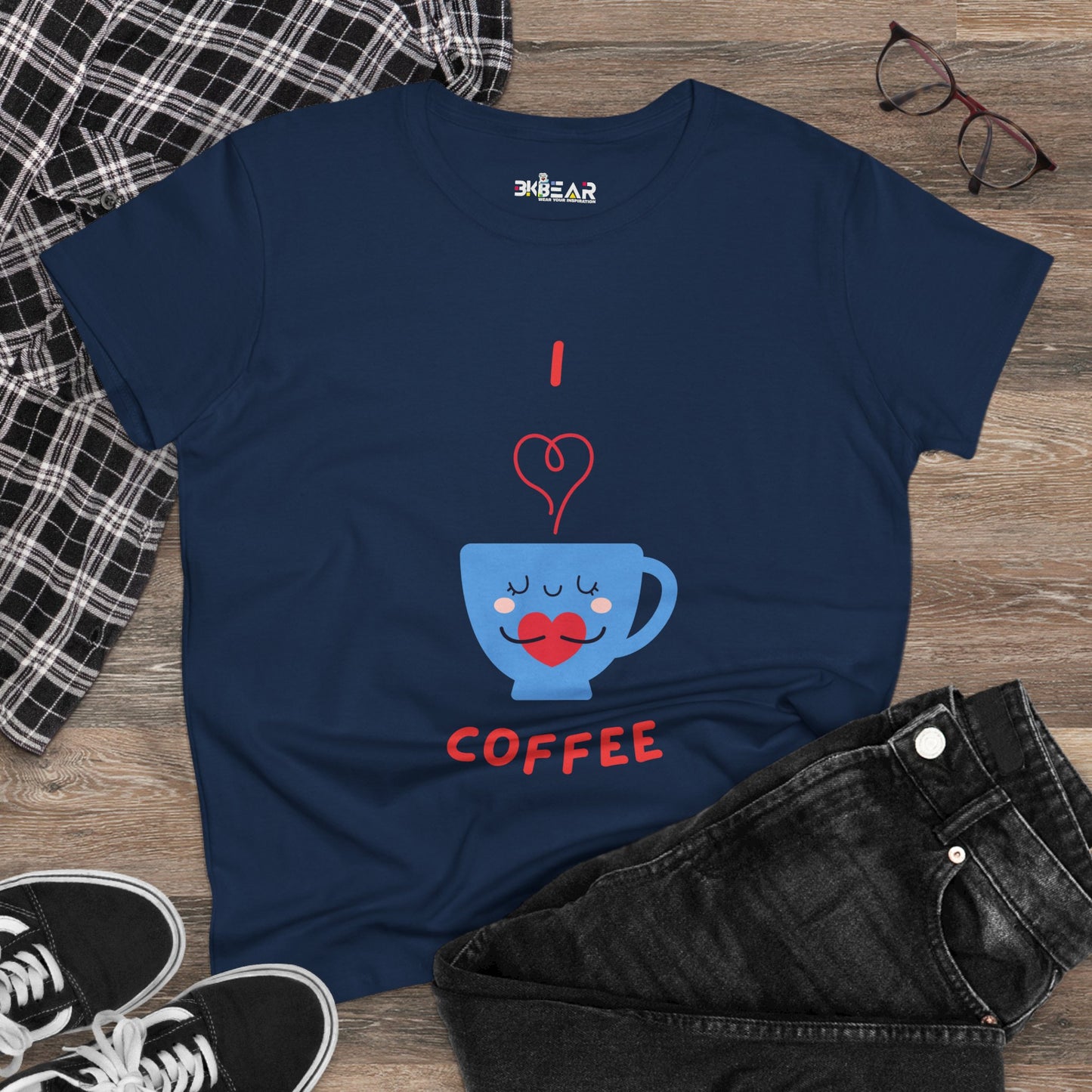 Navy blue Printify t-shirt with I love coffee design laid out with jeans, sneakers, and glasses for coffee and tees fans