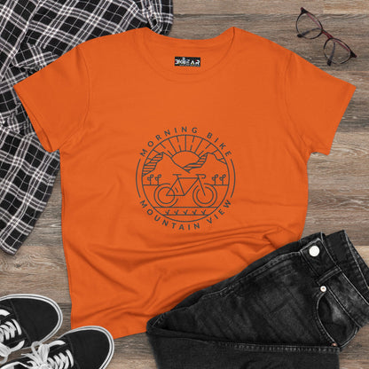 Orange Printify t-shirt with morning bike t-shirt design featuring a bike and mountain view