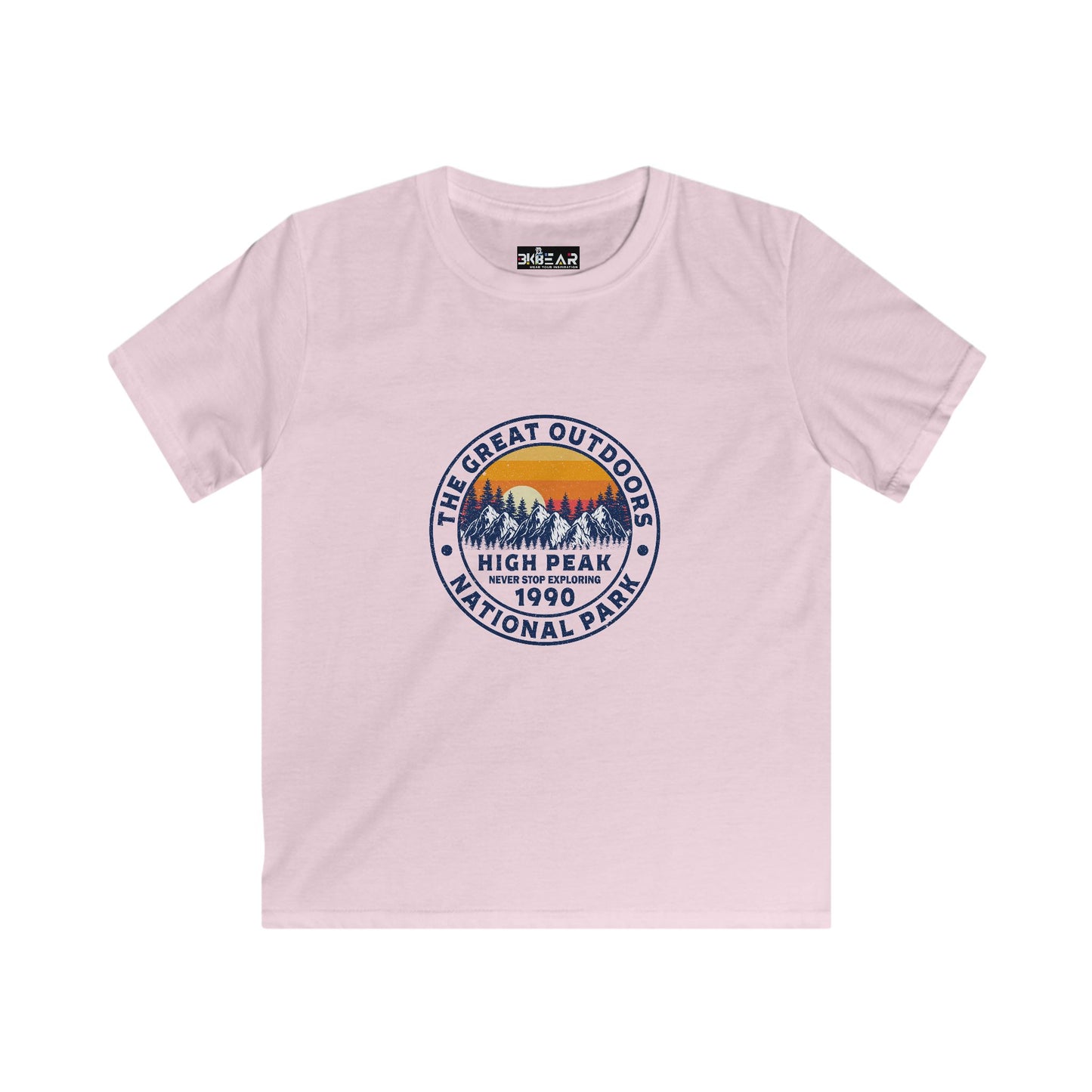 Light pink kids shirt with mountain and sunset print featuring never stop exploring kids shirt design