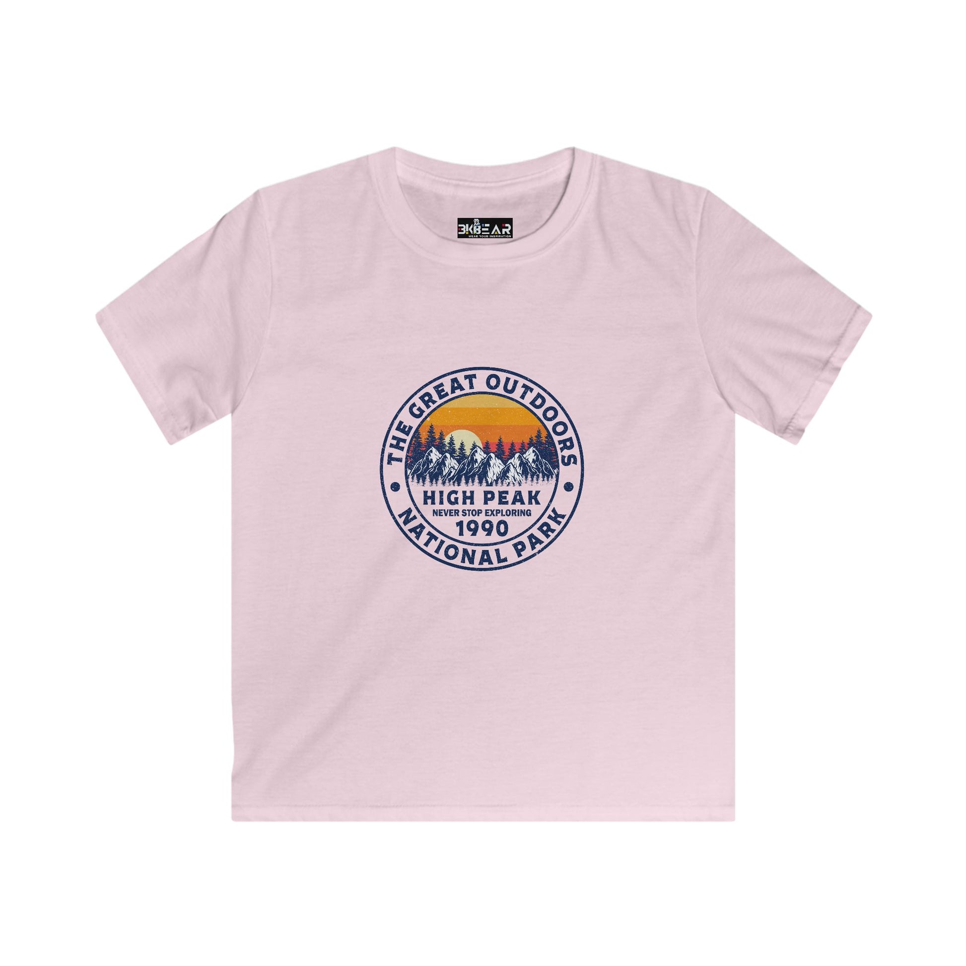 Light pink kids shirt with mountain and sunset print featuring never stop exploring kids shirt design