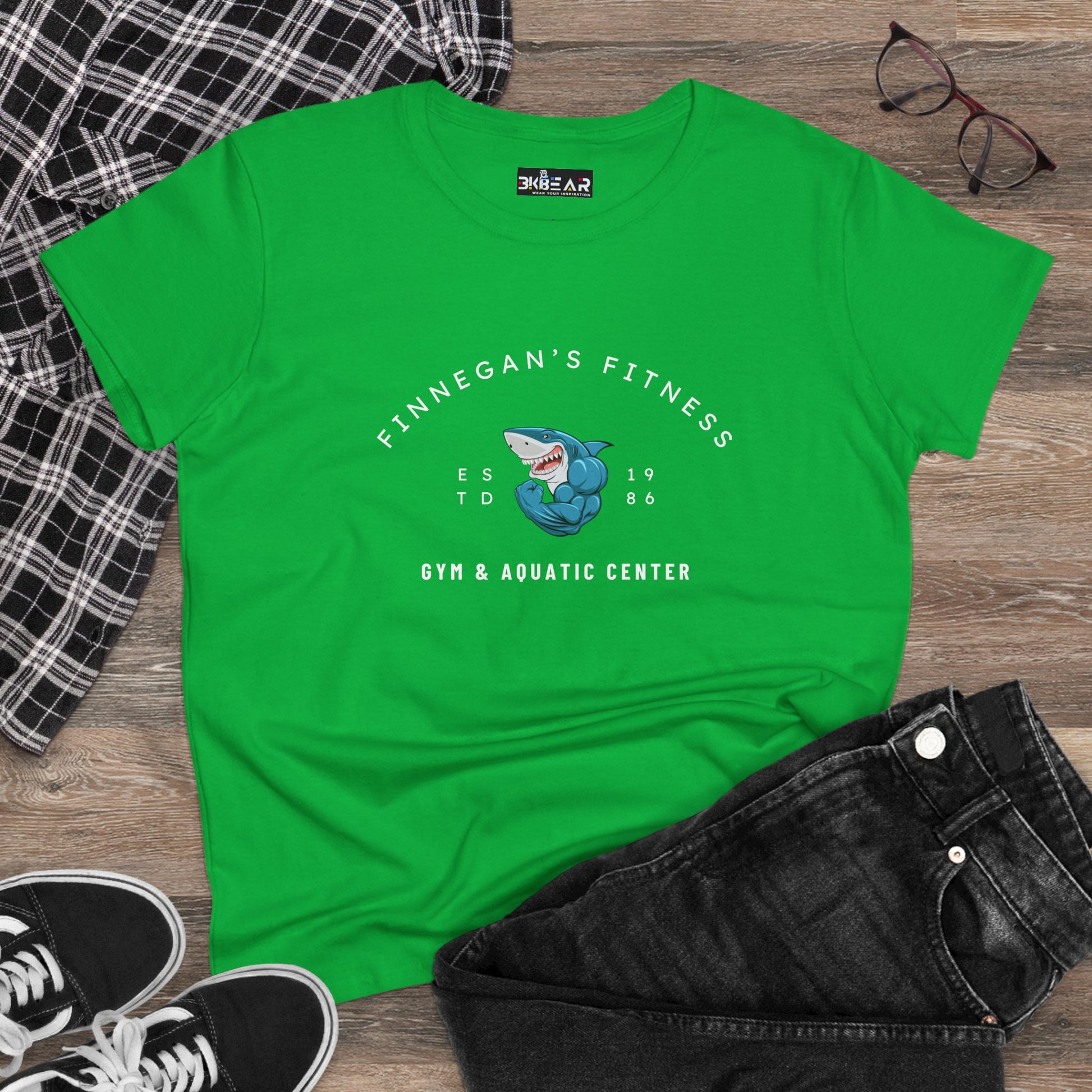 Green workout shirt women graphic featuring Finnegan's Fitness shark logo by Printify