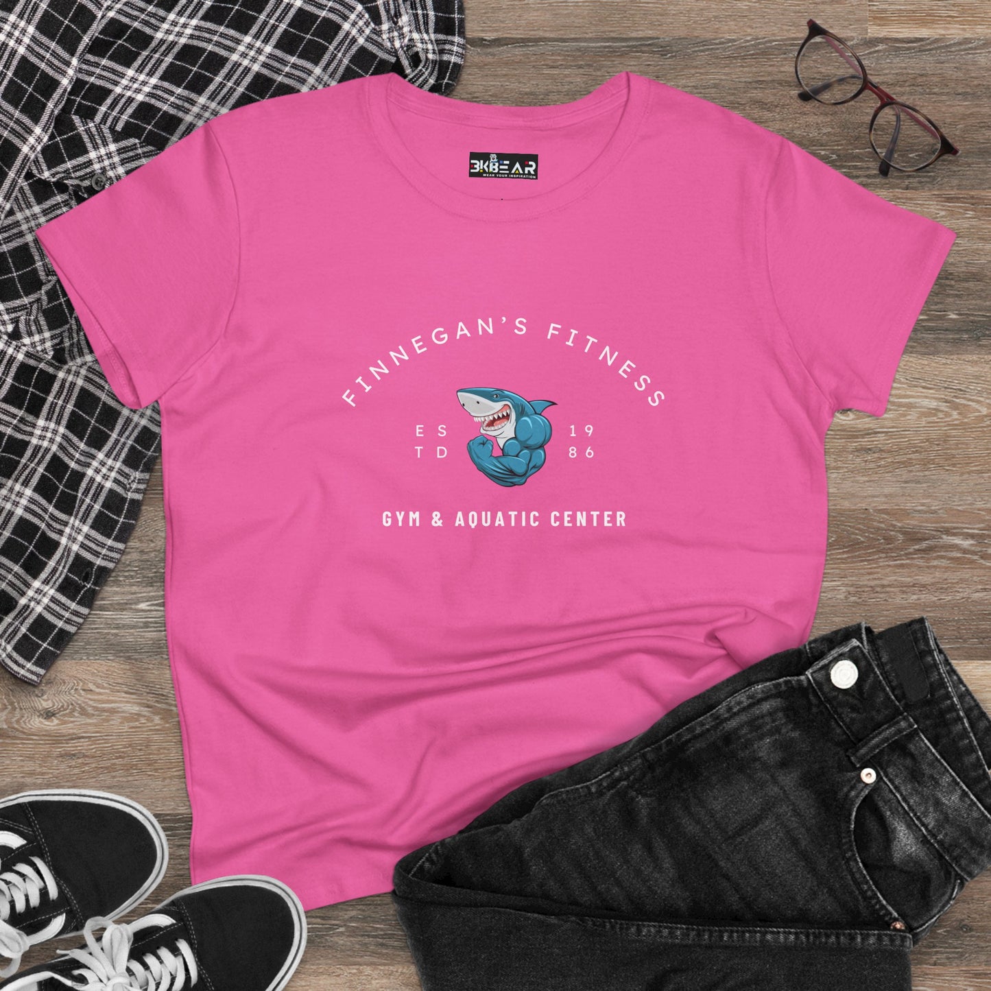 Pink Printify workout shirt women graphic with Finnegan's Fitness shark logo and gym text