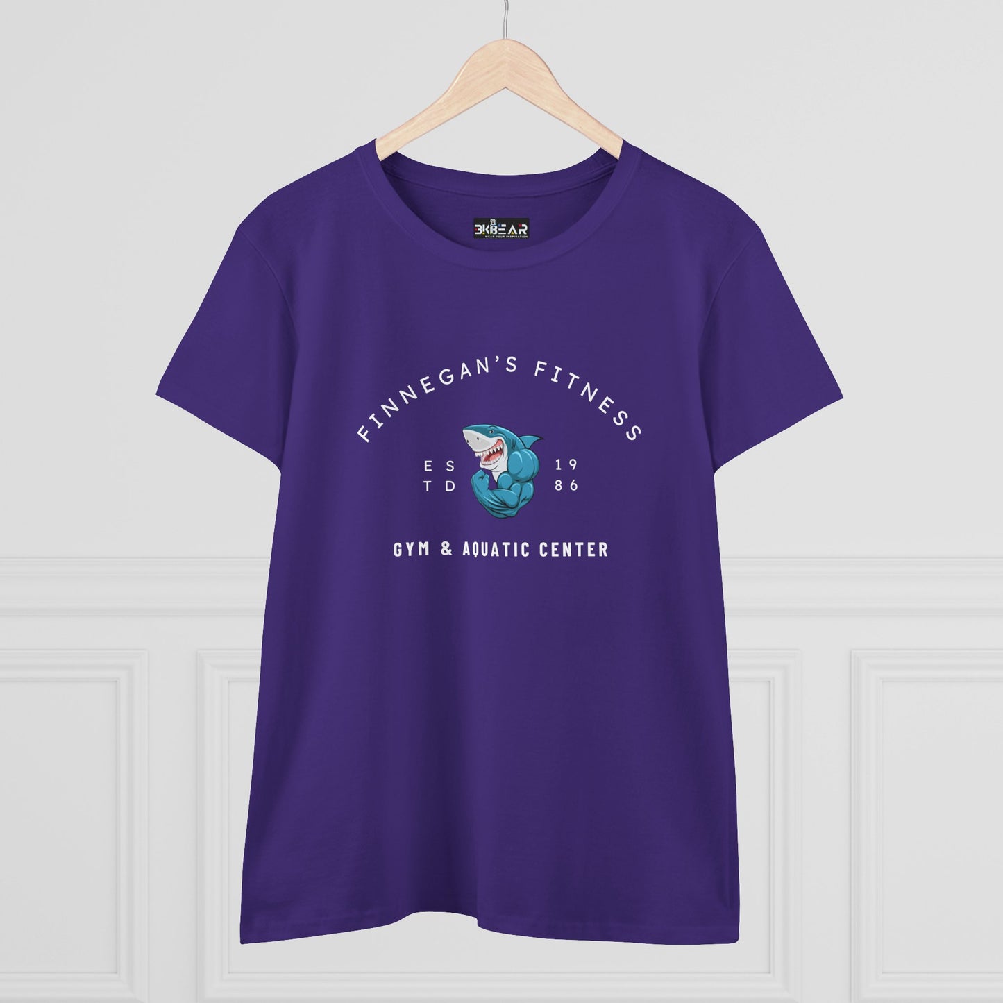 Purple workout shirt women graphic with Finnegan's Fitness shark design printed on front
