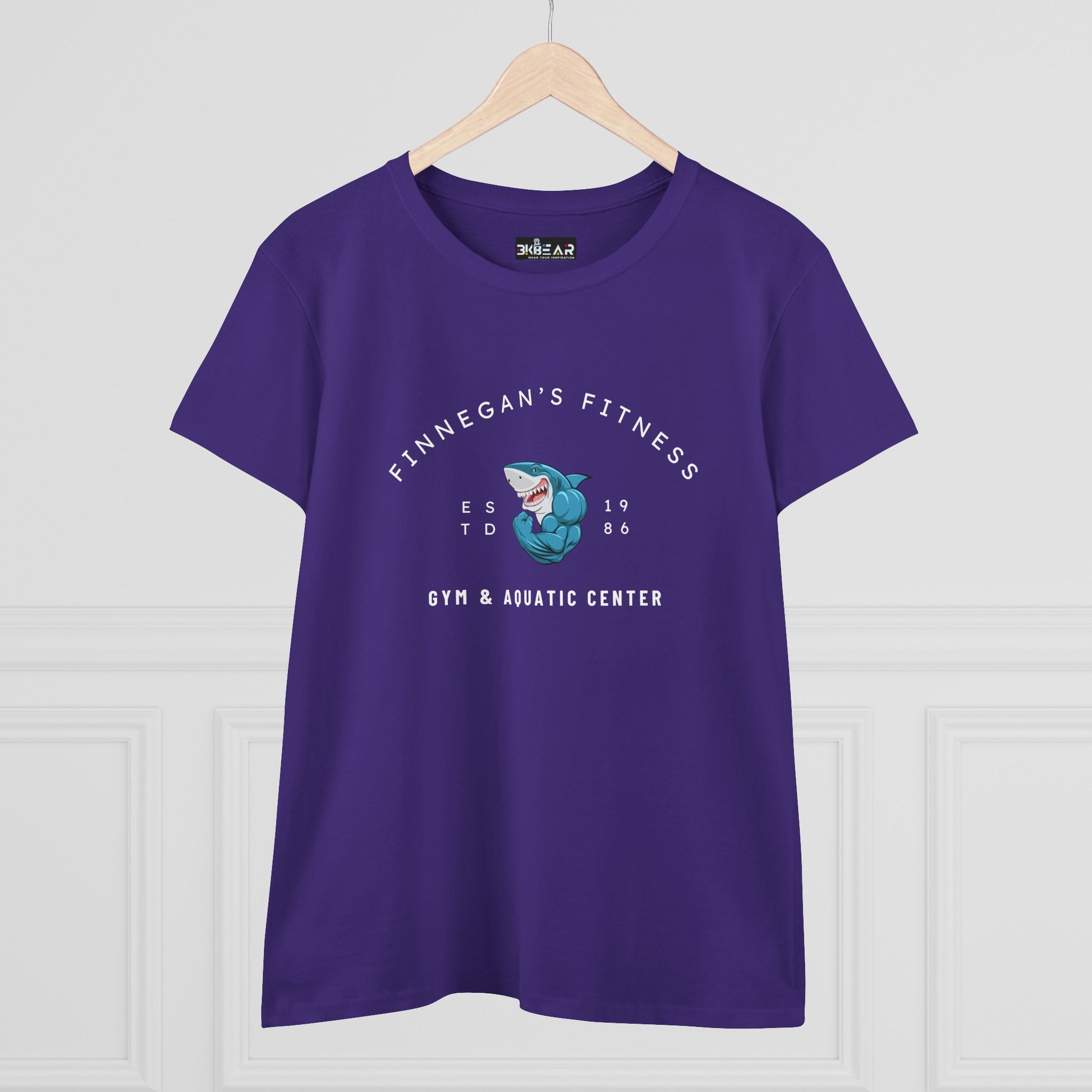 Purple workout shirt women graphic with Finnegan's Fitness shark design printed on front