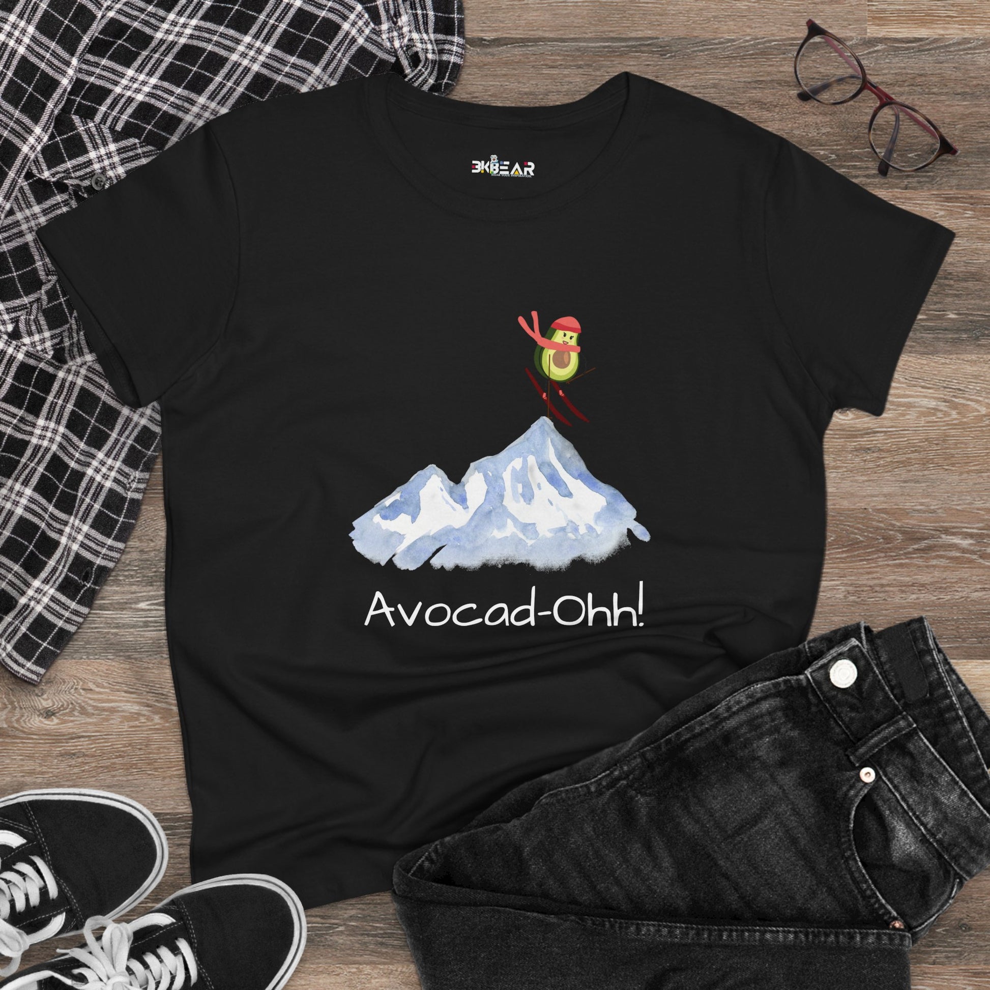 Black avocado graphic tee women with skiing avocado design and Avocad-Ohh text by Printify