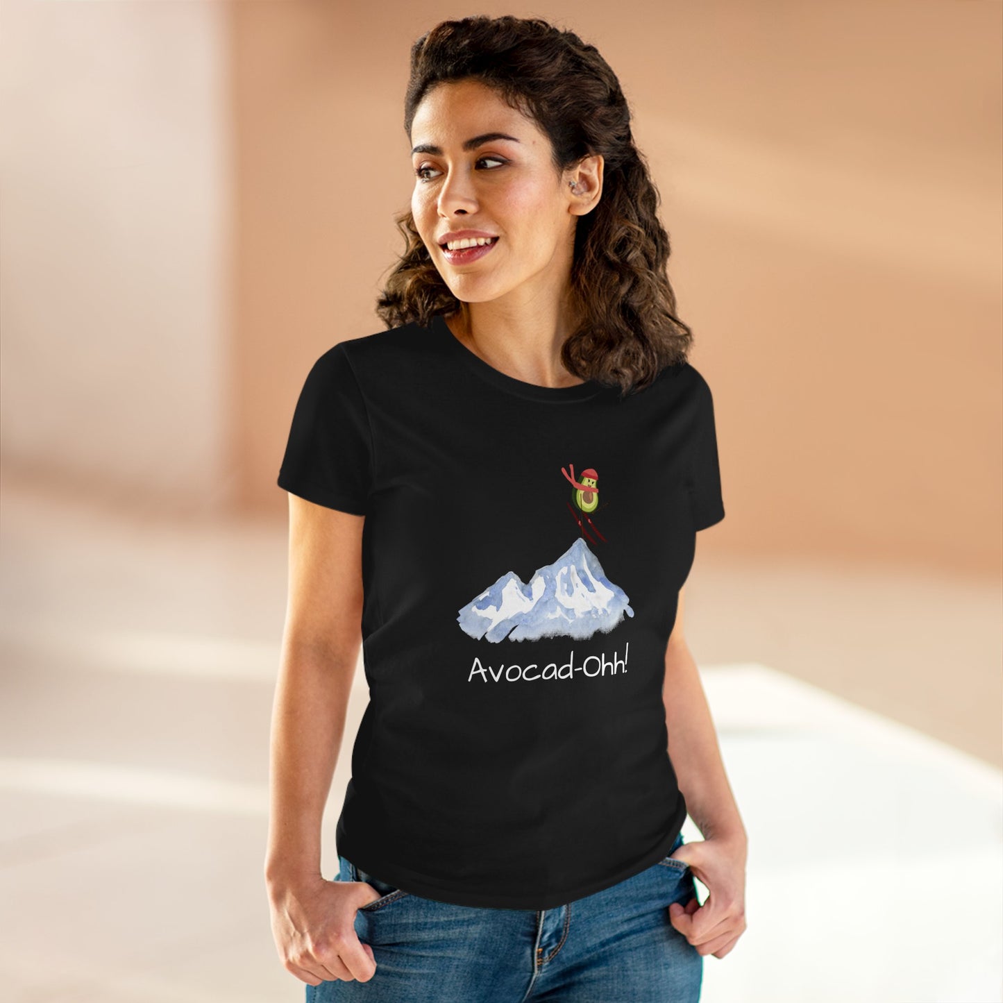 Printify avocado graphic tee women black t-shirt with playful avocado skiing on mountain design