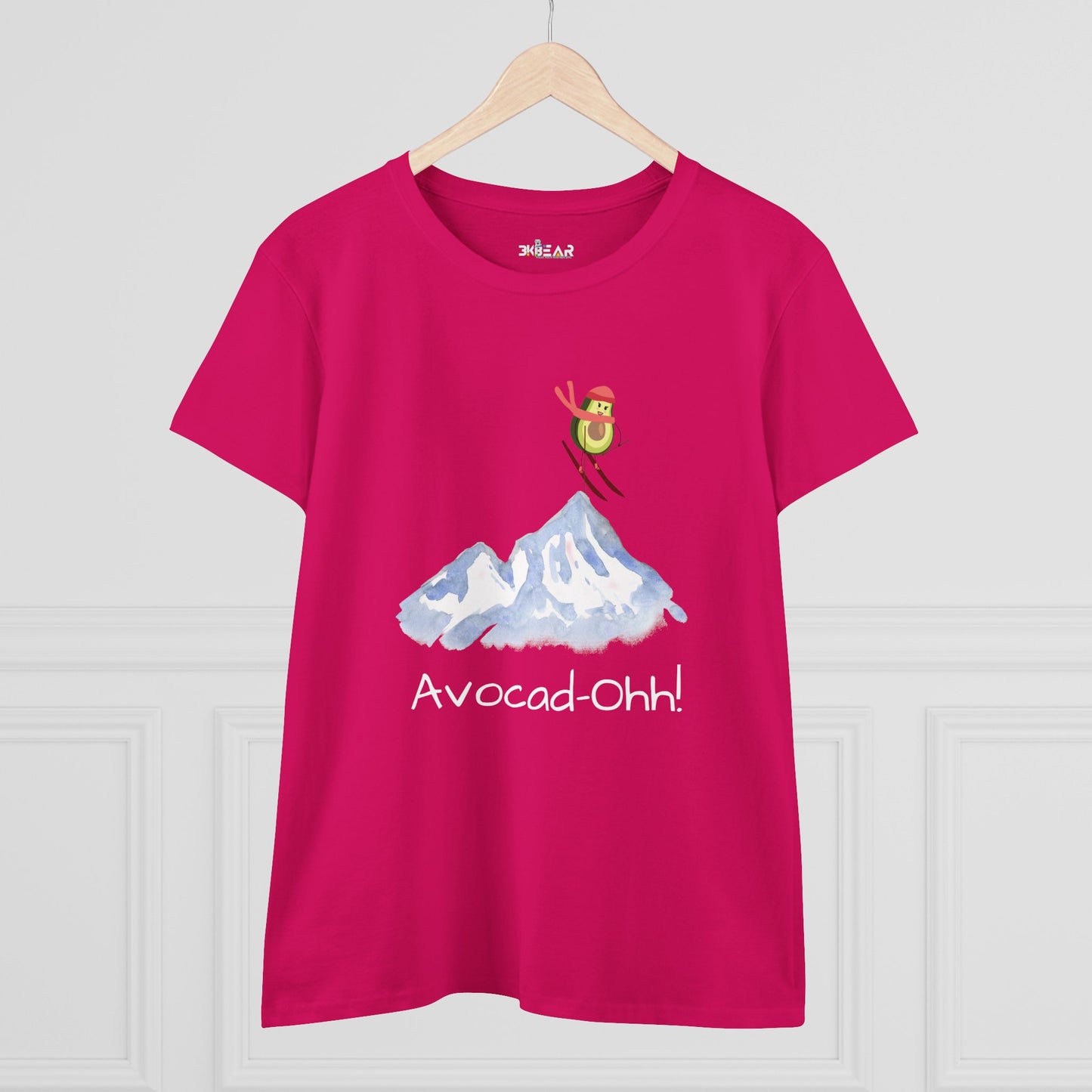 Pink avocado graphic tee women featuring skiing avocado illustration with mountain and text Avocad-Ohh