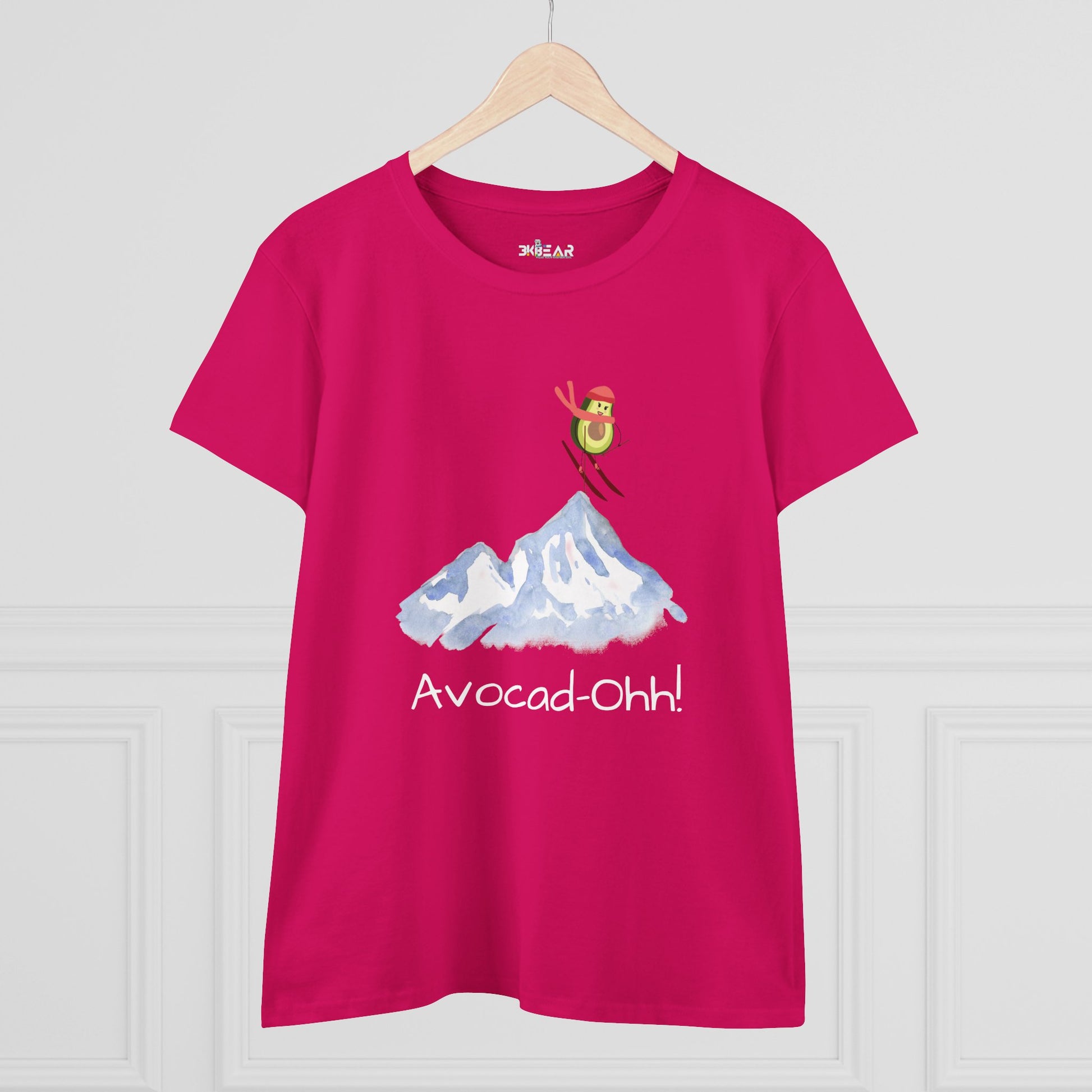 Pink avocado graphic tee women featuring skiing avocado illustration with mountain and text Avocad-Ohh
