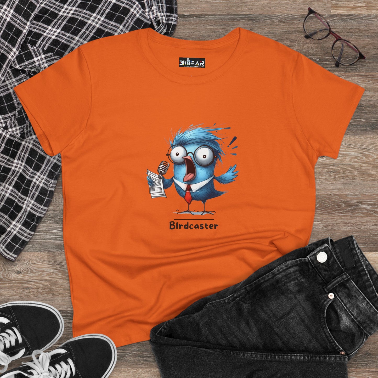 Orange bird lover shirt women with cartoon blue bird holding microphone and paper on front