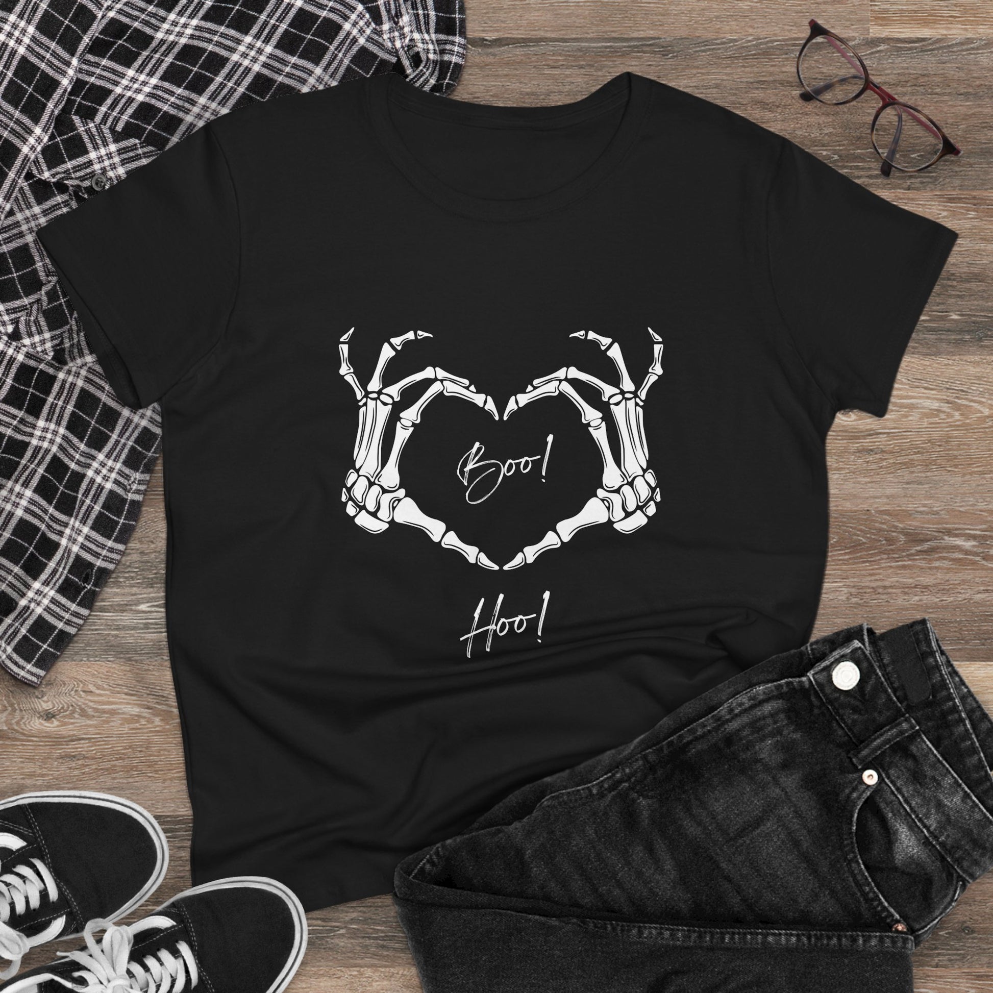 Black boo hoo t-shirt women with skeleton hands heart design laid on wood background