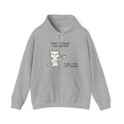 Light gray but first coffee hoodie with cat holding coffee cup and humorous text design