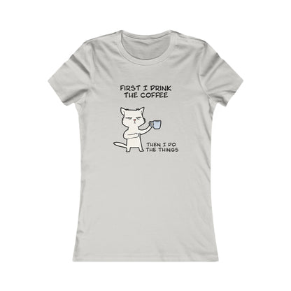 Light gray but first coffee tee shirt featuring a cute cat holding a coffee cup with humorous text
