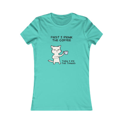 Turquoise but first coffee tee shirt with a cat holding a coffee cup and text design