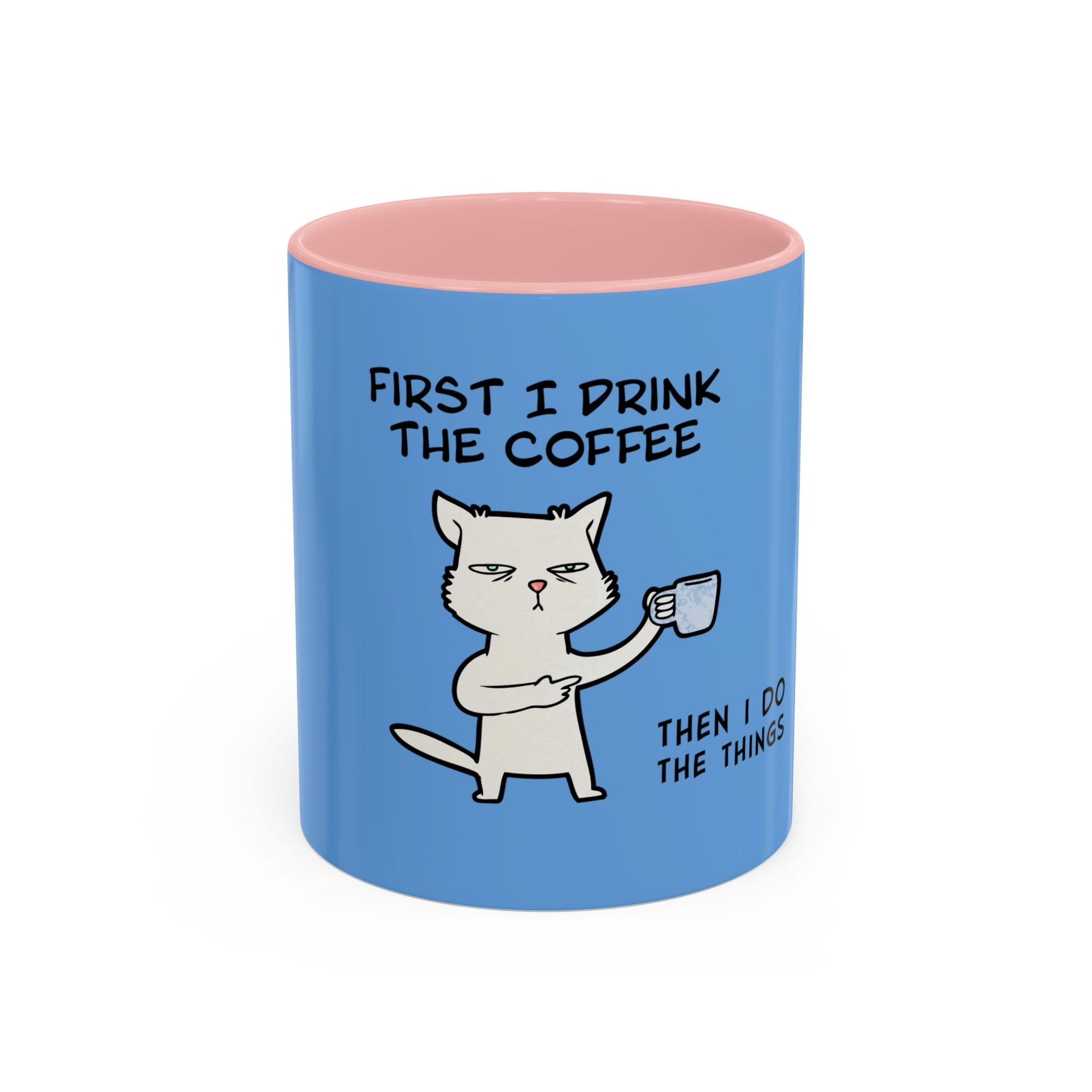 Blue coffee mug with pink interior featuring a cat illustration and humorous coffee mugs quote