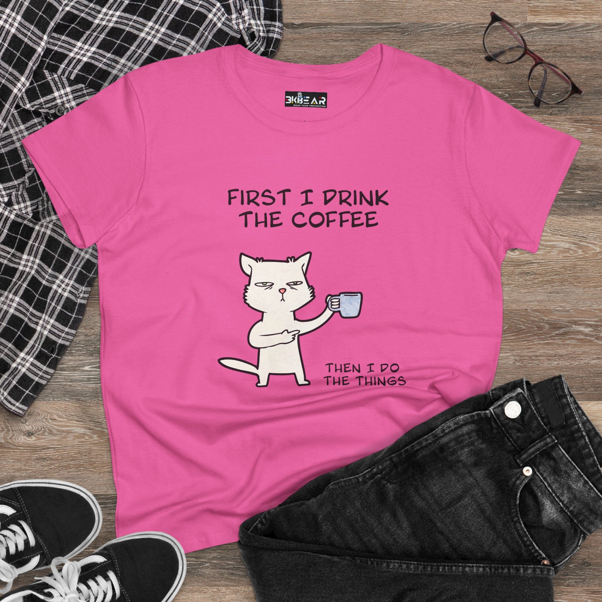 Pink cat coffee shirt with cartoon cat holding a coffee cup and humorous text on front