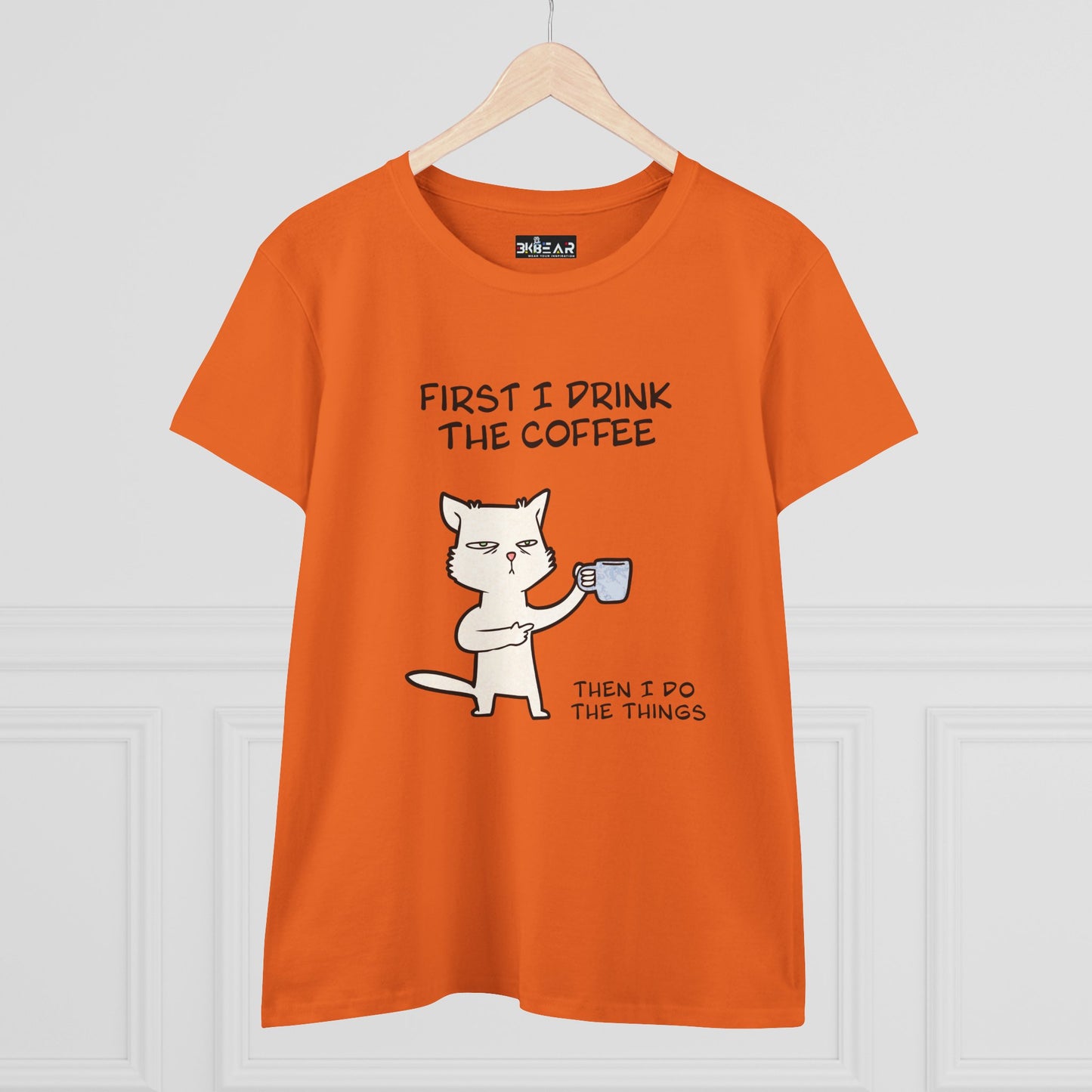 Orange cat coffee shirt with a white cat holding a coffee cup and humorous text