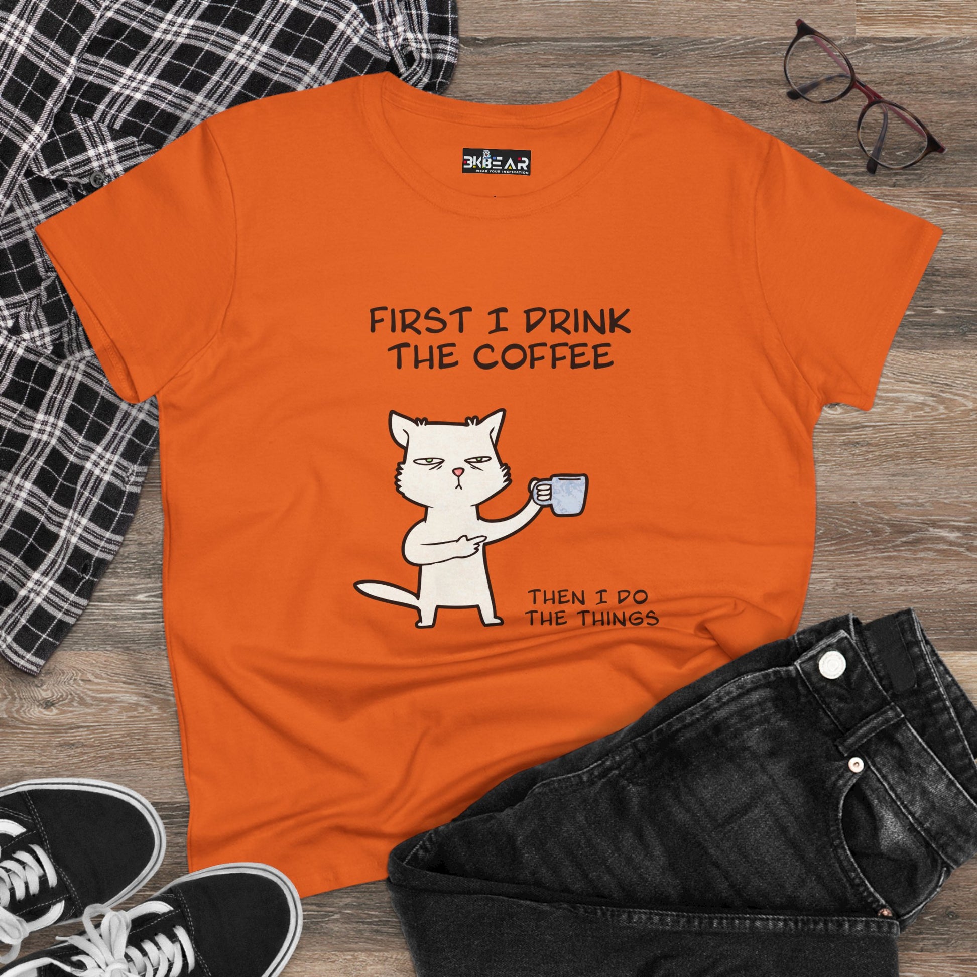 Orange cat coffee shirt with a funny white cat drinking coffee graphic and humorous text
