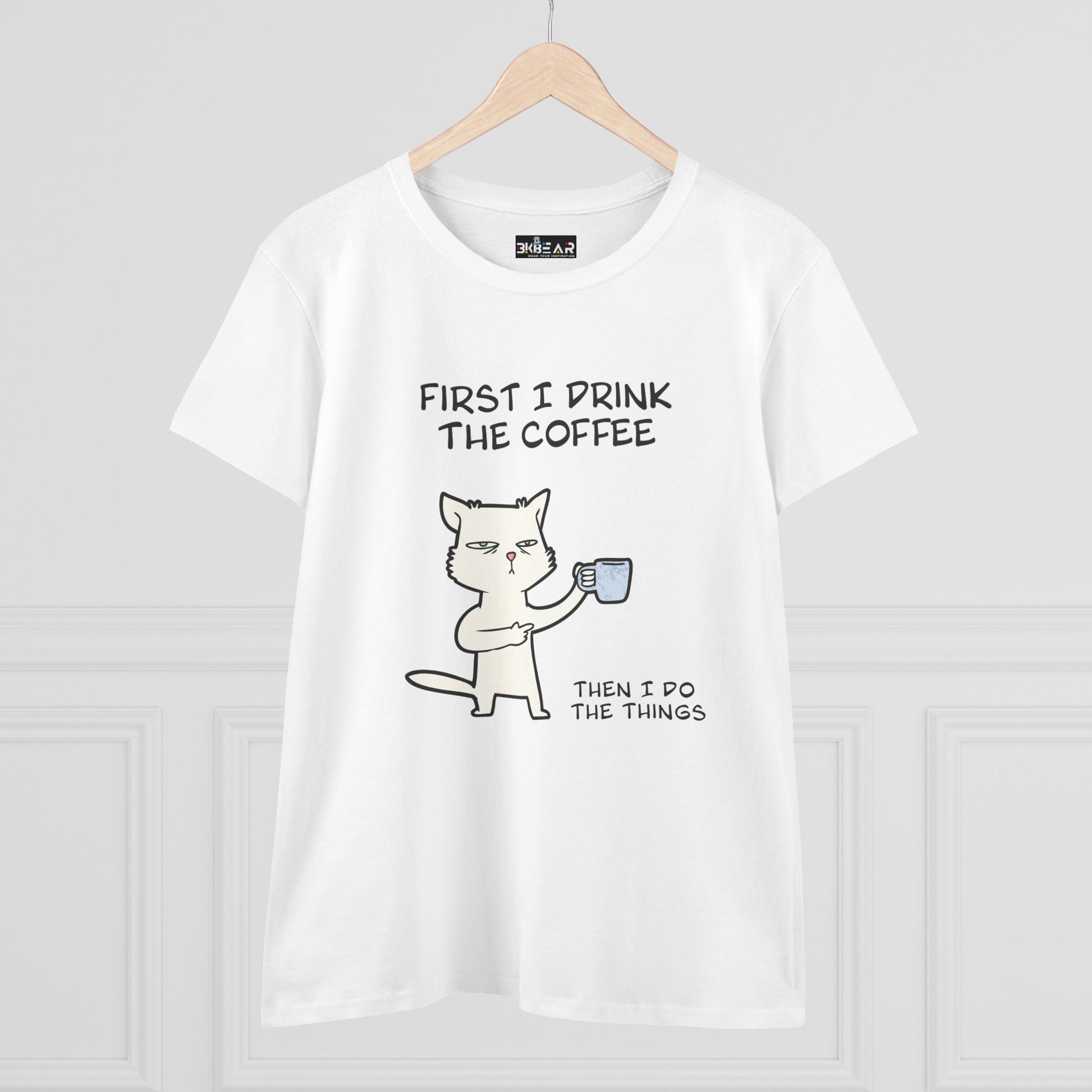 White cat coffee shirt with a cartoon cat holding a coffee cup and humorous text design