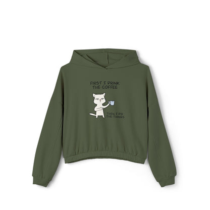 Olive green cinch women's hoodie from Printify with cat drinking coffee graphic and text
