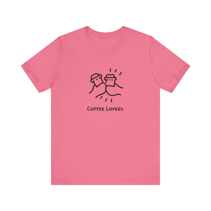 Pink Printify coffee lovers tee with simple black coffee cup design and text coffee lovers