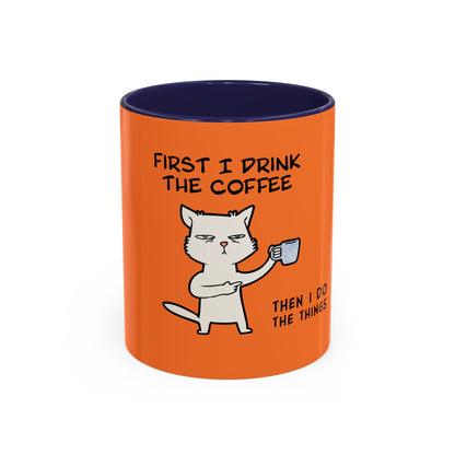 Orange Printify coffee mug with funny cat graphic and text first I drink the coffee then I do the things