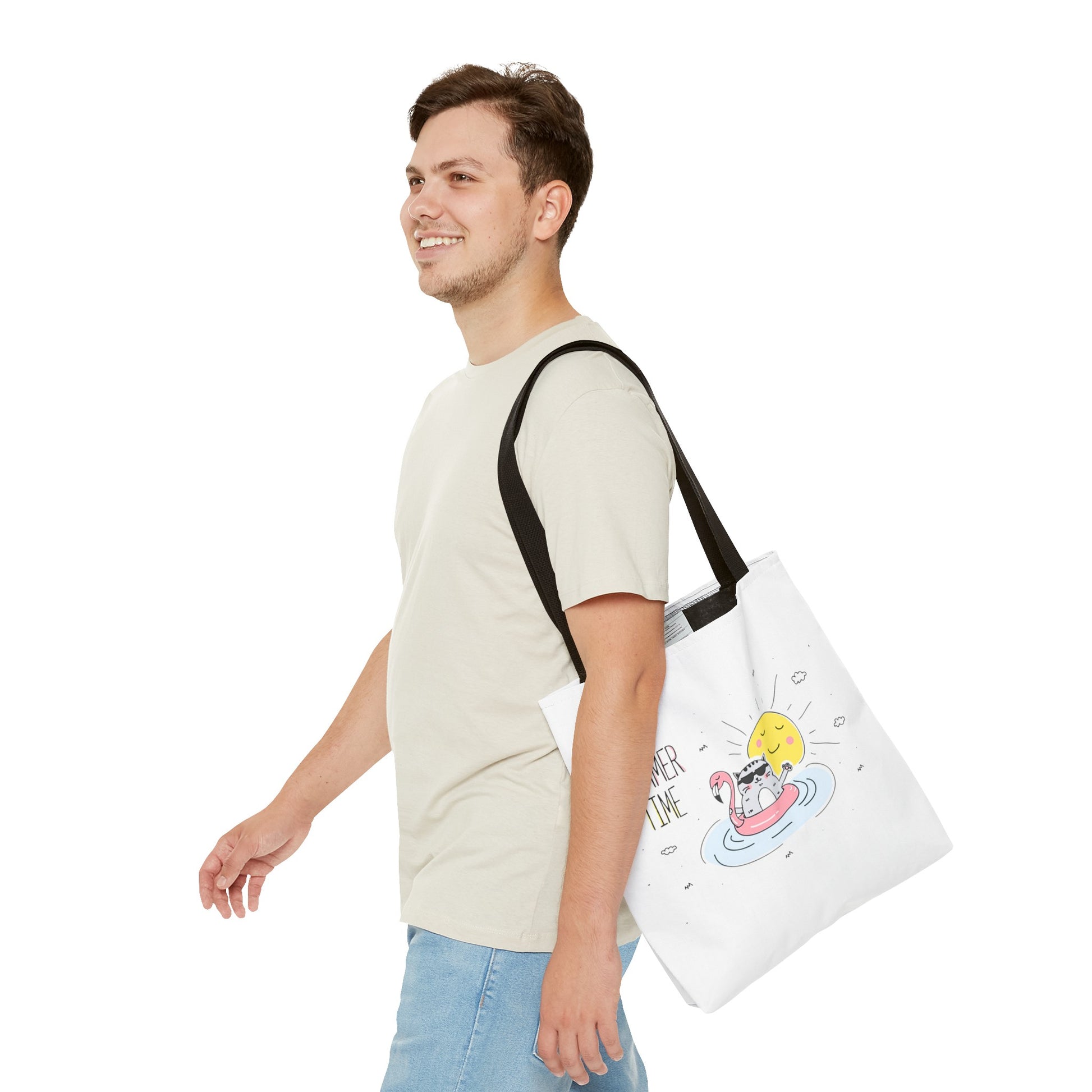 Printify cute graphic tote for summer with sun and flamingo design carried by smiling man