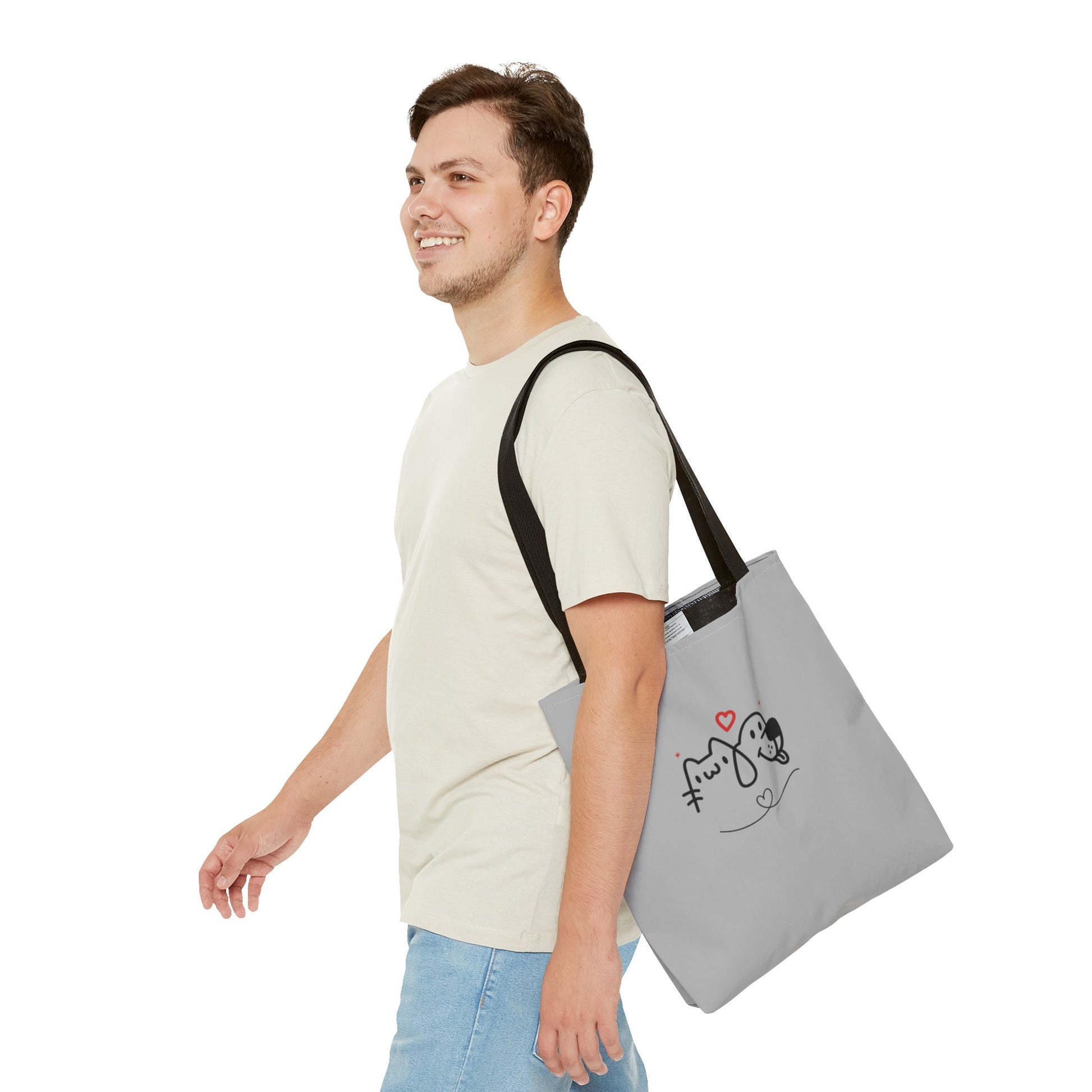 Man carrying Printify cute puppy tote bag with black straps and simple puppy design