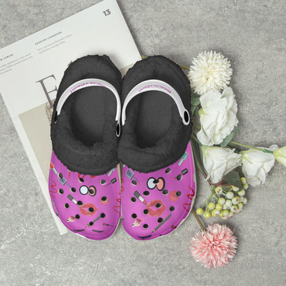 Fuzzy clogs for women in purple with black fur lining and white straps, decorated with lipstick and makeup designs