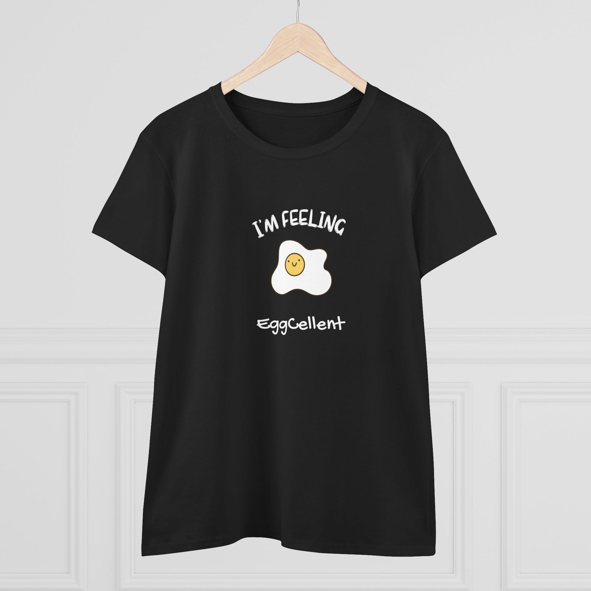 Black Printify T-Shirt with a cheerful fried egg graphic and text I'm feeling eggcellent pun tee