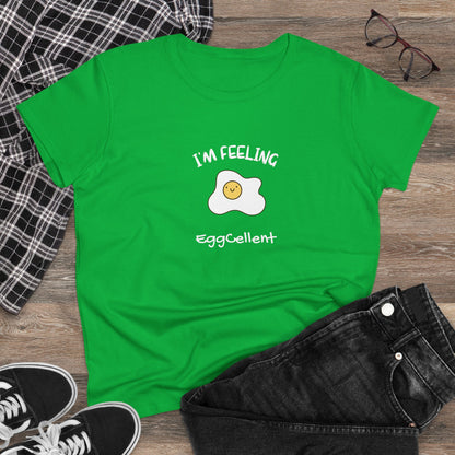Green Printify T-shirt with a smiling fried egg and text I'm feeling eggcellent pun tee design