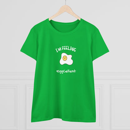 Green Printify t-shirt with smiling fried egg and I'm feeling eggcellent pun tee design
