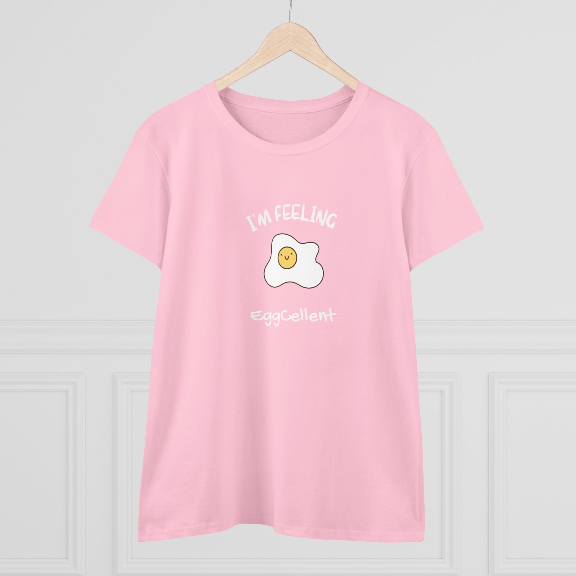 Pink Printify t-shirt with cute fried egg graphic and eggcellent pun tee text design