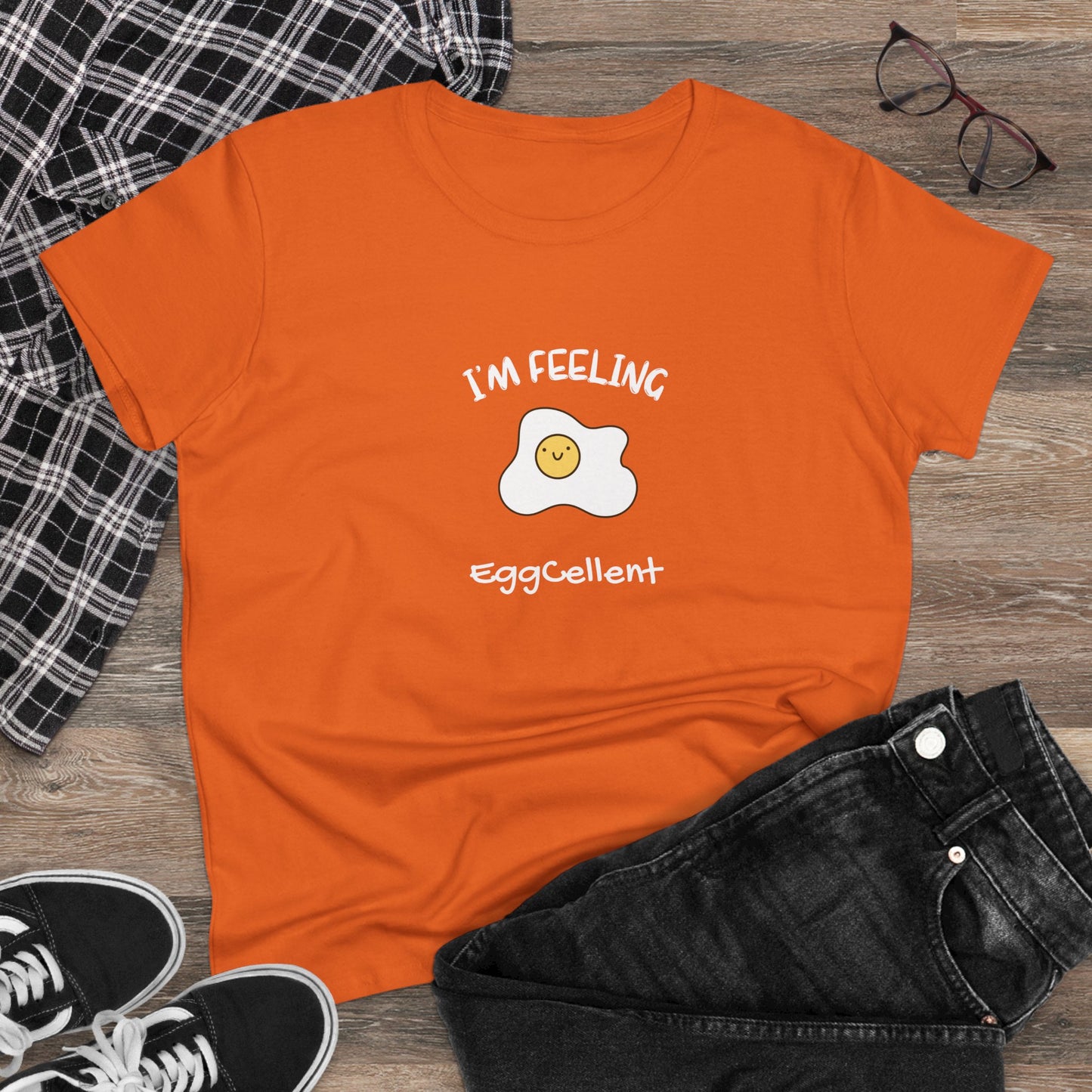Orange Printify T-shirt with cute fried egg graphic and I'm feeling eggcellent pun tee design