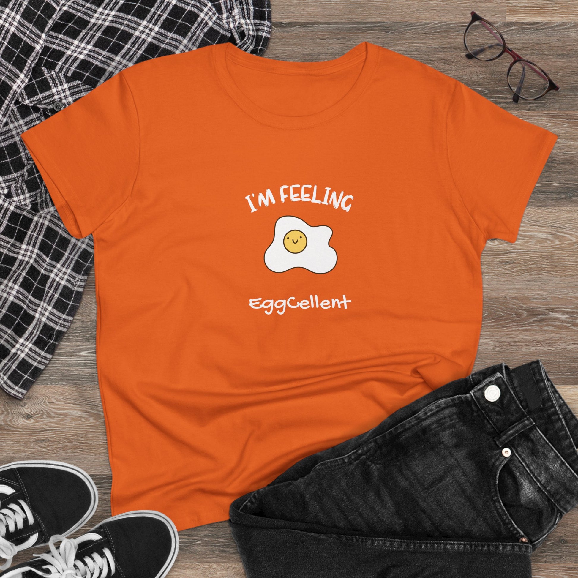 Orange Printify T-shirt with cute fried egg graphic and I'm feeling eggcellent pun tee design