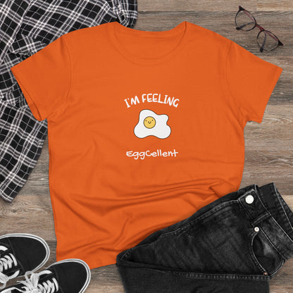 Orange Printify T-shirt with cute fried egg graphic and I'm feeling eggcellent pun tee design