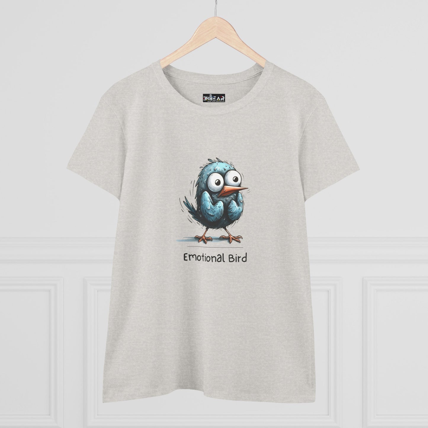 Printify light gray t-shirt featuring a cartoon emotional bird tee with large eyes and text emotional bird