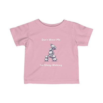 Pink funny baby shirt with playful sheep walking graphic and text saying Dont Wake Me Im Sheep Walking